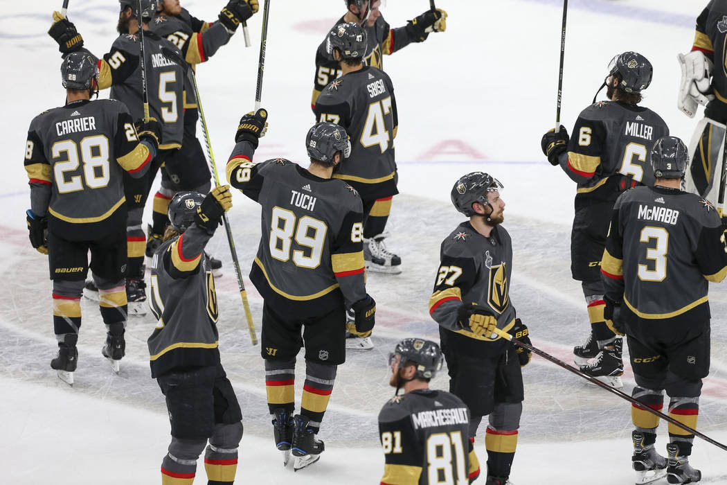 Members of the Vegas Golden Knights acknowledge the crowd after their 4-3 loss to the Washington Capitals in Game 5 of the NHL hockey Stanley Cup Final at T-Mobile Arena in Las Vegas on Thursday, ...