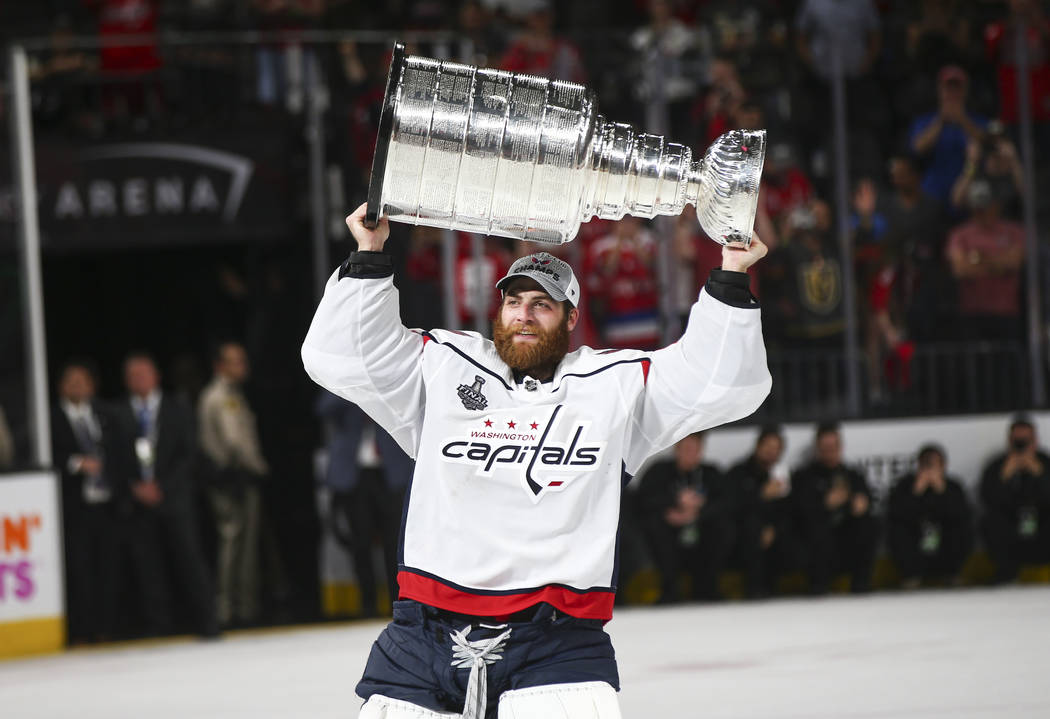 Washington Capitals goaltender Braden Holtby (70) celebrate after defeating the Golden Knights in Game 5 to win the Stanley Cup Final at T-Mobile Arena in Las Vegas on Thursday, June 7, 2018. Chas ...