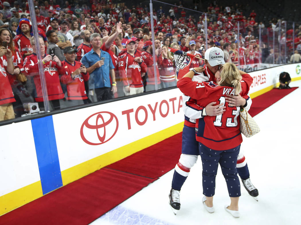 Washington Capitals left wing Jakub Vrana (13) celebrates with a loved one after defeating the Golden Knights in Game 5 to win the Stanley Cup Final at T-Mobile Arena in Las Vegas on Thursday, Jun ...