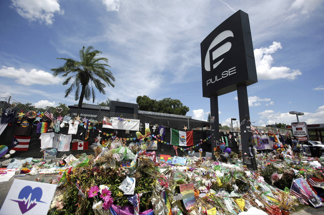 A makeshift memorial is shown outside the Pulse nightclub in Orlando, Fla., in this July 11, 2016, file photo. Survivors and victims’ relatives are marking the second anniversary of the Pulse ni ...