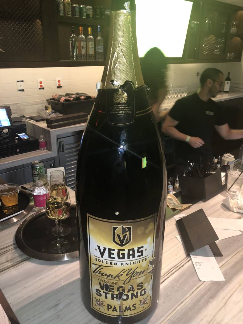 A somewhat weathered 15-liter bottle of Moet Chandon with a customized Vegas Golden Knights label his shown atop a VIP bar at Pearl at the Palms on Friday, June 9, 2018. (John Katsilometes/Las Veg ...