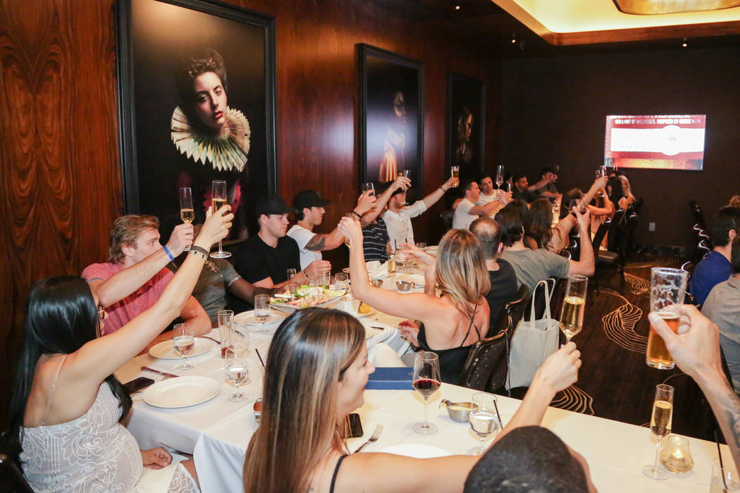 Members of the Vegas Golden Knights toast the 2017-18 season at Scotch 80 Prime at the Palms on Friday, June 8, 2018 (Edison Graff)