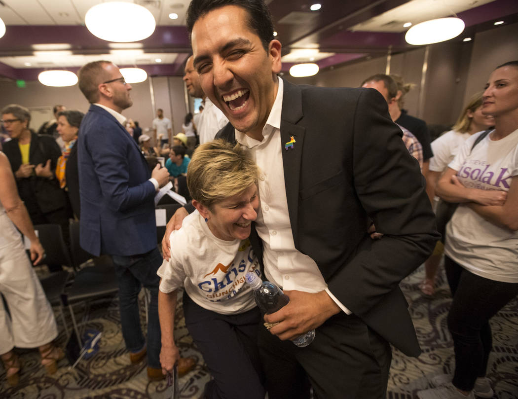 Democratic gubernatorial candidate Chris Giunchigliani, left, shares a laugh with Assemblyman and Secretary of State candidate Nelson Araujo during a Get Out the Vote rally hosted by the Human Rig ...