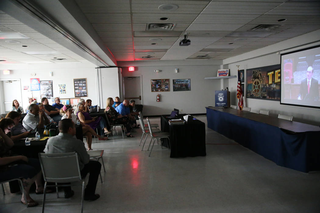 People attend a watch party of the state Supreme Court hearing involving Teamsters Local 14 to determine who represents support staff, at the Teamsters Local 14 headquarters in Las Vegas, Wednesda ...