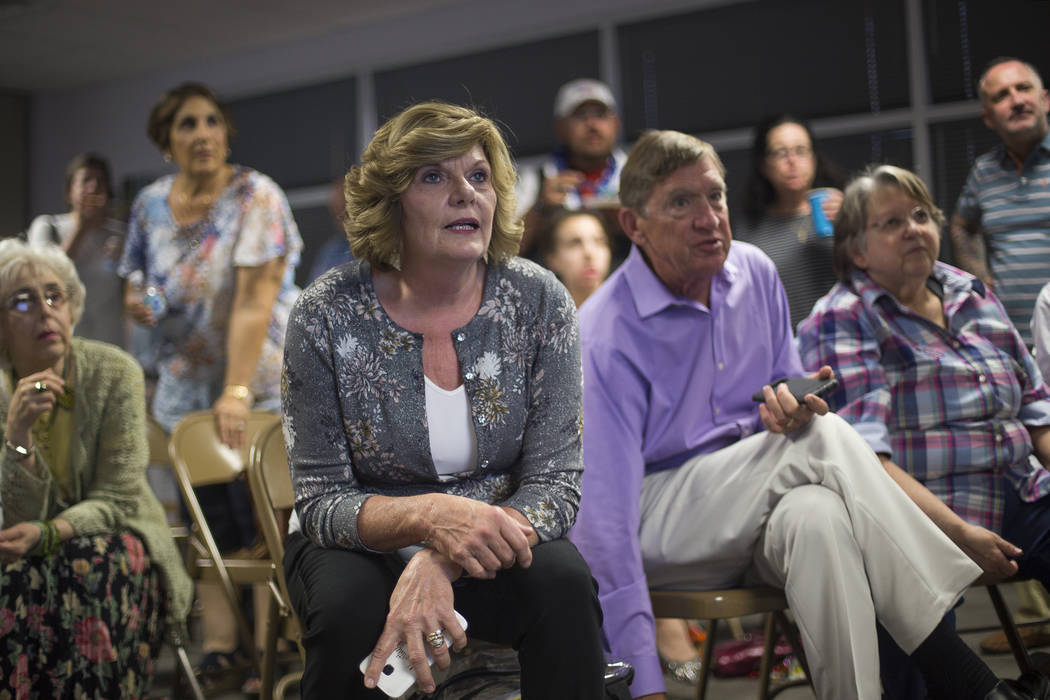 Connie Munk, a Democrat running for Nevada Assembly District 4, watches results next to her husband, Richard Munk at a Democrat primary election watch party at the Service Employee International U ...