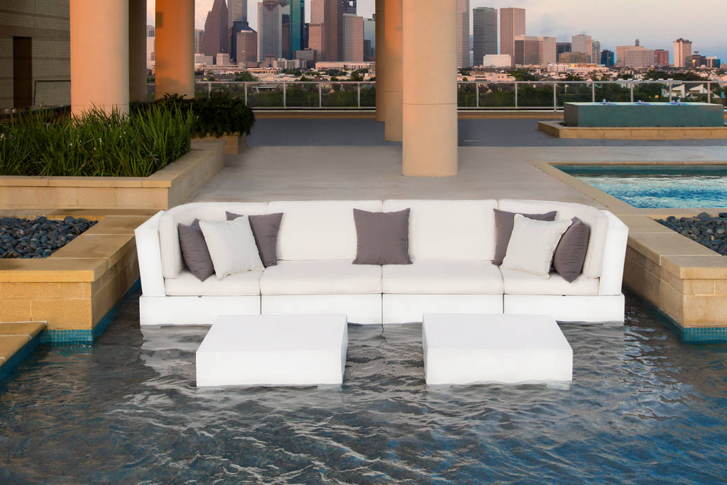 Ledge Lounger The Ledge Lounger in-pool Signature sectional and table is made up of modular pieces that can be connected into different arrangements to fit your space. The sectional’s high-quali ...