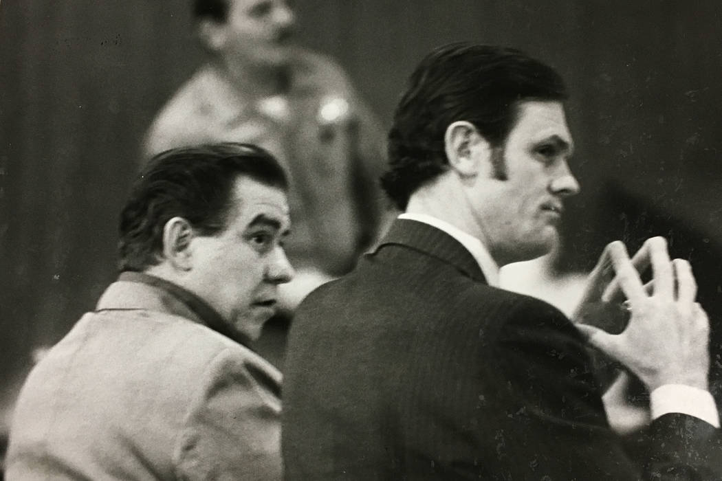 In this 1984 file photo, Thomas Crump, left, accused of murdering a woman who worked for an escort service, and his attorney Richard Maurer listen to testimony. Jurors watched Crump's videotaped c ...