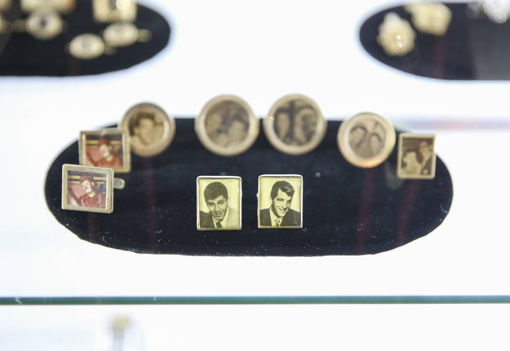 A group of cufflinks with photographs of comedian Jerry Lewis and others on display during the Julian's Auctions Property from the estate of Jerry Lewis inside Planet Hollywood Resort in Las Vegas ...