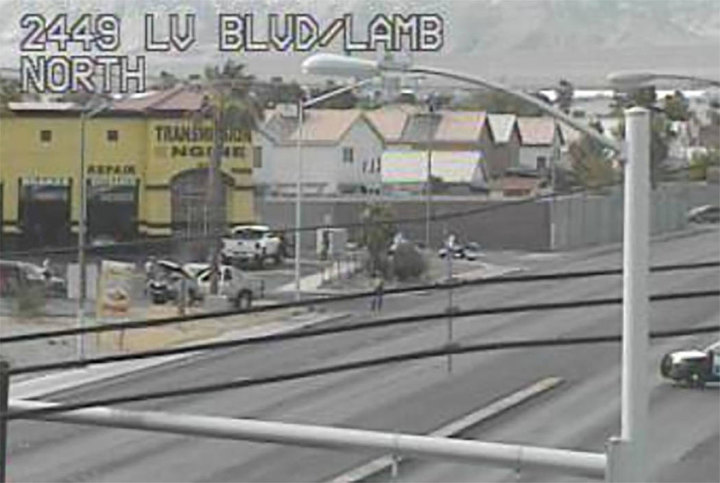 Police work the scene of a fatal car crash on Lamb Boulevard north of Las Vegas Boulevard on Friday. (RTC cameras)