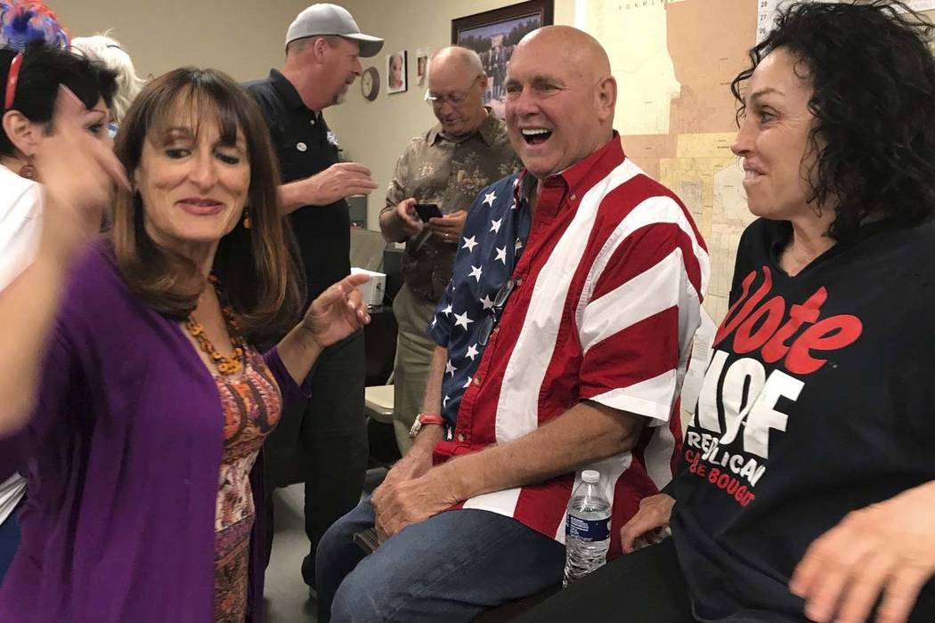Nevada brothel owner Dennis Hof, second from right, celebrates in Pahrump on Tuesday after winning the primary election. Hof, the owner of half a dozen legal brothels in Nevada and star of the HBO ...