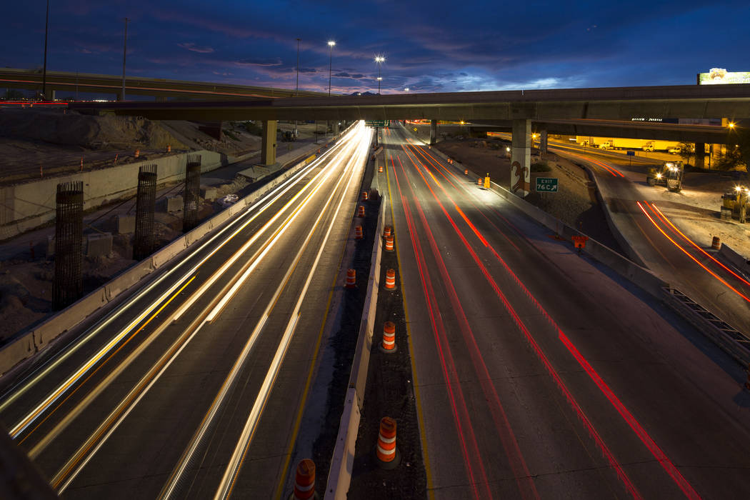 Vehicles travel along U.S. Highway 95 through the Spaghetti Bowl freeway interchange near downtown Las Vegas on Friday, April 6, 2018. Richard Brian Las Vegas Review-Journal @vegasphotograph