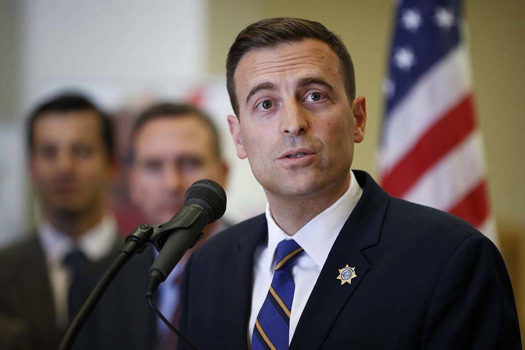 Nevada state Attorney General Adam Paul Laxalt speaks at a news conference on a lawsuit against Purdue Pharma, Tuesday, May 15, 2018, in Las Vegas. (AP Photo/John Locher)