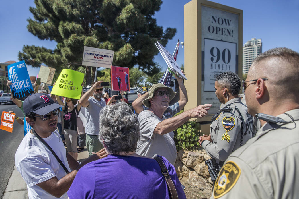 Protesters clash with Metro outside Suncoast hotel-casino ahead of President Donald Trump's appearance on Saturday, June 23, 2018, in Las Vegas. Benjamin Hager Las Vegas Review-Journal @benjaminhphoto