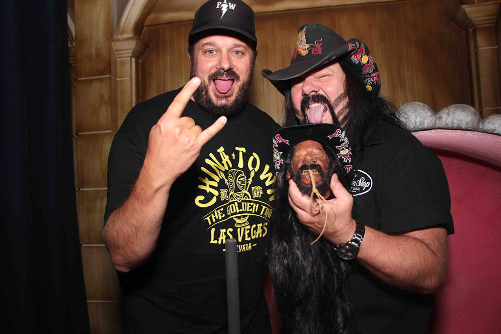 Branden Powers and Vinnie Paul with Paul's shrunken head at The Golden Tiki on Spring Mountain Road. (Courtesy)