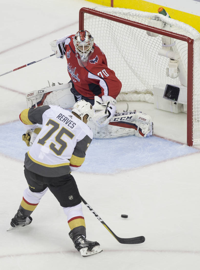 Golden Knights right wing Ryan Reaves (75) shoots on Capitals goaltender Braden Holtby (70) in the second period during Game 3 of the NHL Stanley Cup Final on Saturday, June 2, 2018, at Capital On ...