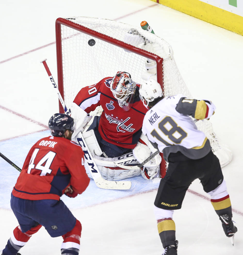 Golden Knights left wing James Neal (18) scores past Washington Capitals goaltender Braden Holtby (70) during the third period of Game 4 of the Stanley Cup Final at Capital One Arena in Washington ...