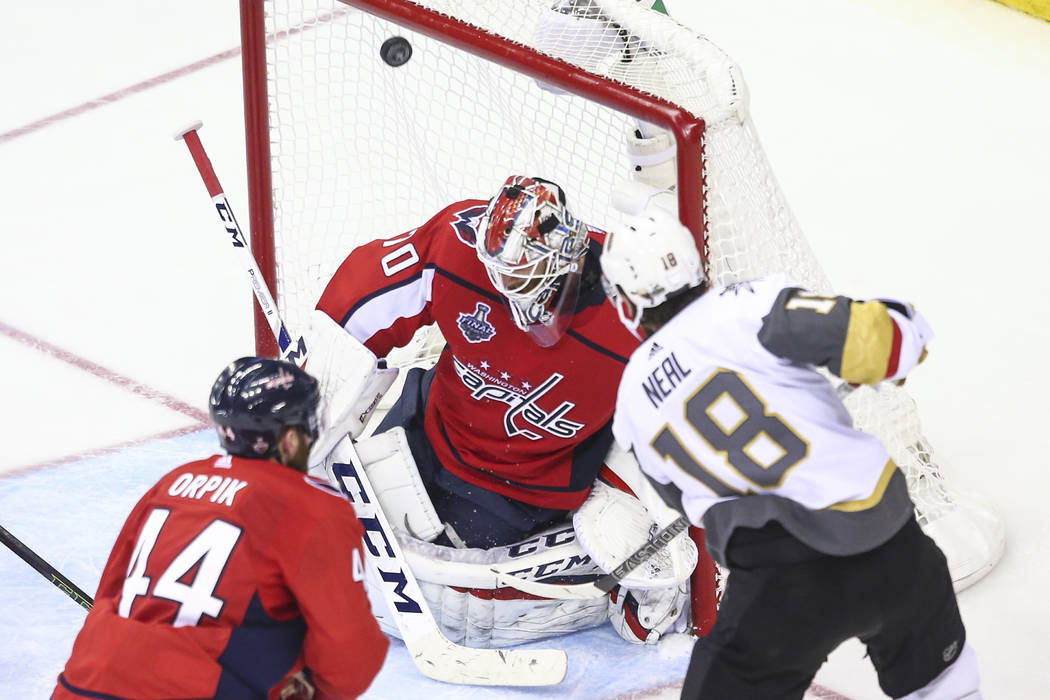 Golden Knights left wing James Neal (18) scores past Washington Capitals goaltender Braden Holtby (70) during the third period of Game 4 of the Stanley Cup Final at Capital One Arena in Washington ...