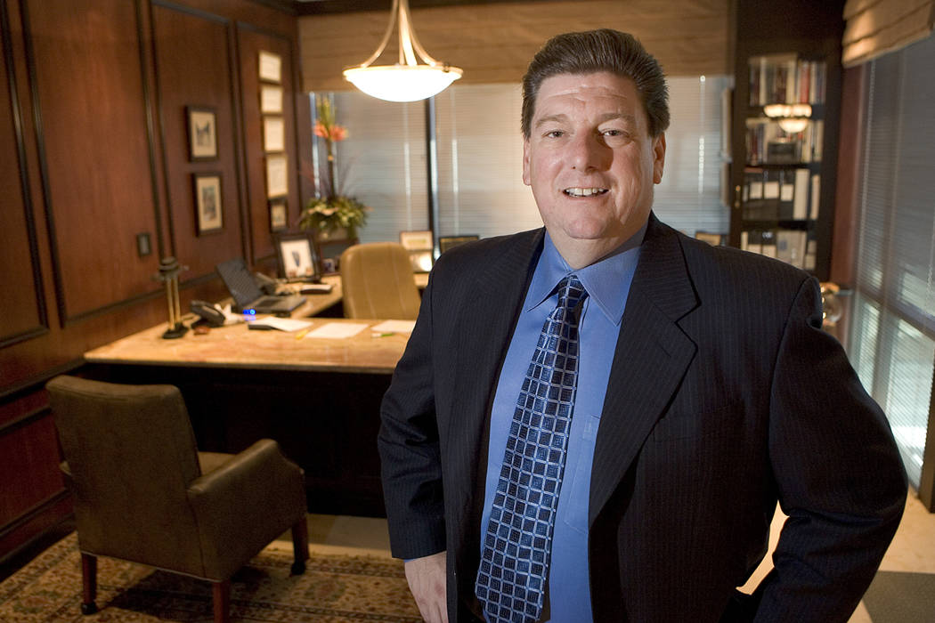 Mike Shustek, owner of Vestin Group, stands in his office, which is covered with sports memorabilia and photographs June 19, 2006. Vestin Group is a prominent hard moneylender who provides key mon ...