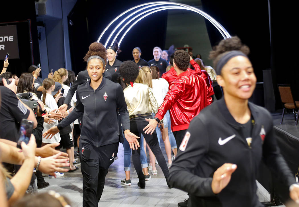 Members of the Las Vegas Aces pass fans as they enter the stadium at a WNBA basketball game at the Mandalay Bay Events Center in Las Vegas, Sunday, June 24, 2018. Rachel Aston Las Vegas Review-Jou ...
