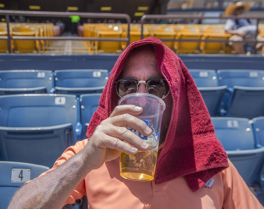 51s fan Ron Feir watches Las Vegas take on the Reno Aces in mid-day temperatures reaching 106 degrees on Sunday, June 24, 2018, at Cashman Field, in Las Vegas. Benjamin Hager Las Vegas Review-Jour ...
