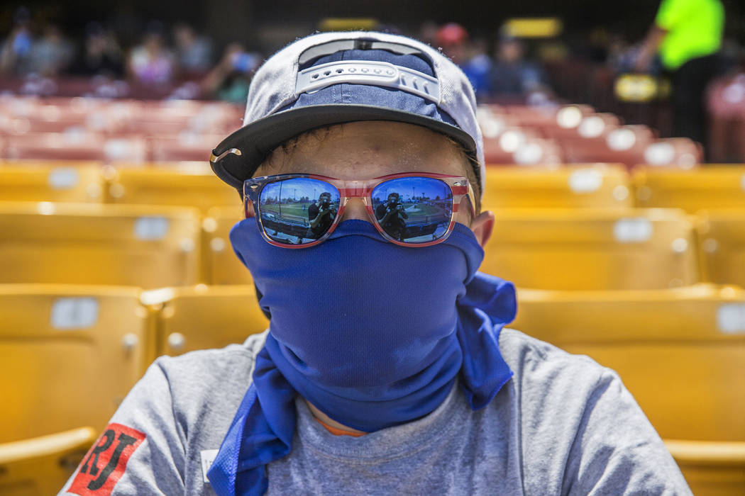 51s fan T.J. Leger watches Las Vegas take on the Reno Aces in mid-day temperatures reaching 106 degrees on Sunday, June 24, 2018, at Cashman Field, in Las Vegas. Benjamin Hager Las Vegas Review-Jo ...