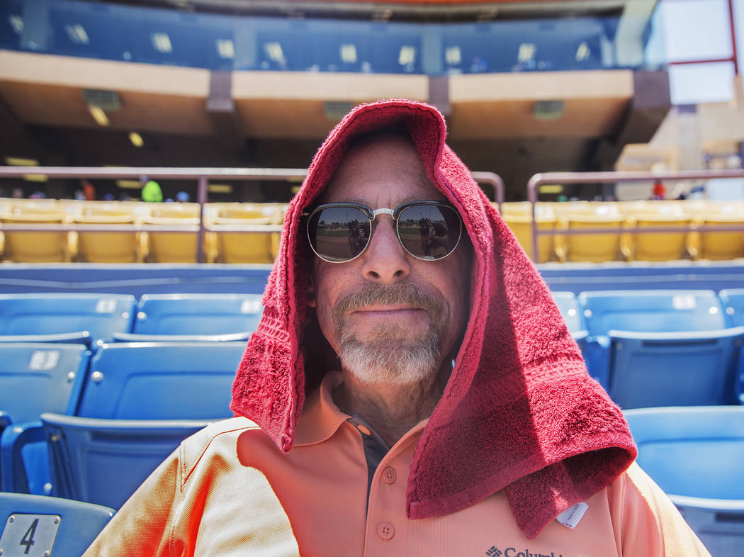 51s fan Ron Feir watches Las Vegas take on the Reno Aces in mid-day temperatures reaching 106 degrees on Sunday, June 24, 2018, at Cashman Field, in Las Vegas. Benjamin Hager Las Vegas Review-Jour ...