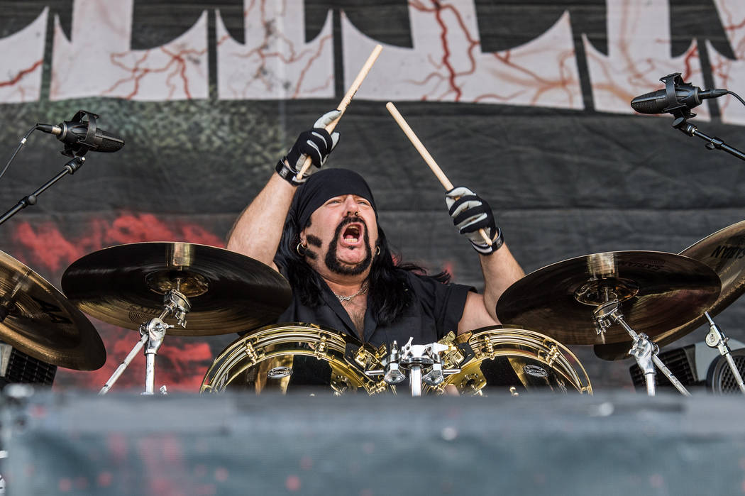 Vinnie Paul of HELLYEAH performs at the Louder Than Life Festival on Saturday, Oct. 1, 2016, in Louisville, Ky. (Amy Harris/Invision/AP)