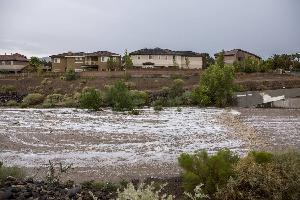 Floodwaters rush through the Pittman Wash in Henderson during a monsoon rainstorm on Wednesday, July 19, 2017. (Patrick Connolly/Las Vegas Review-Journal) @PConnPie