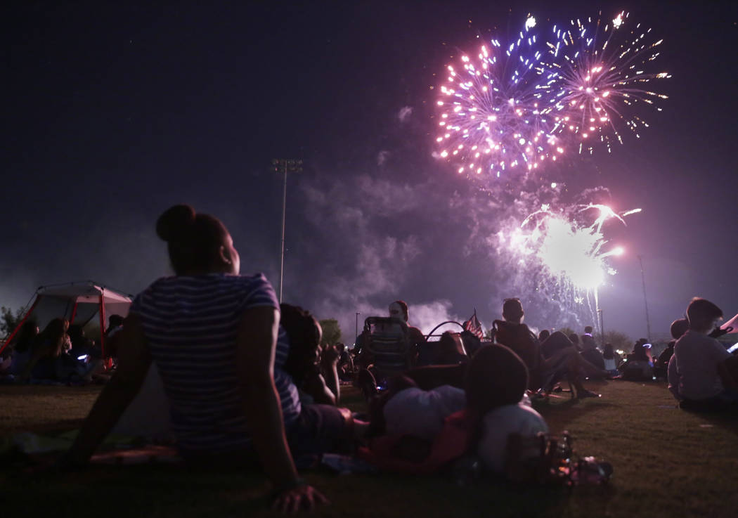 People enjoy the fireworks show at the City of Henderson's Fourth of July celebration at Heritage Park in Henderson, Tuesday, July 4, 2017. (Gabriella Angotti-Jones/Las Vegas Review-Journal) @gabr ...