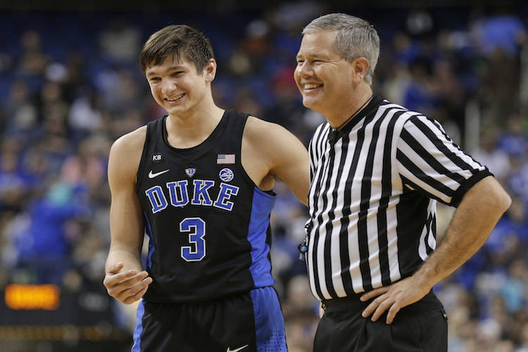 Duke's Grayson Allen (3) shares a laugh with an official in the second half of an NCAA college basketball game against Elon in Greensboro, N.C., Wednesday, Dec. 21, 2016. Duke won 72-61. (Chuck Bu ...