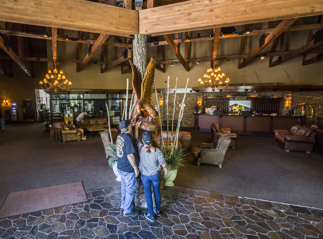 Scott and Marsha Sumpter take a look at an eagle sculpture in the lobby of The Resort on Mount Charleston on Friday, June 29, 2018, in Las Vegas. Benjamin Hager Las Vegas Review-Journal @benjaminh ...
