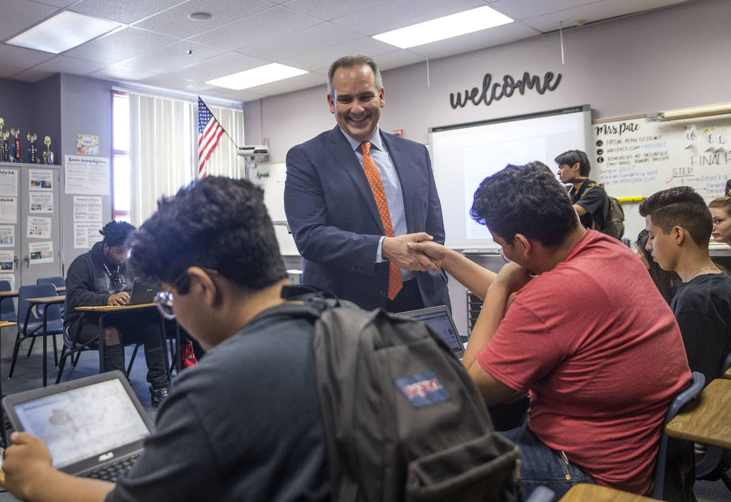 Clark County School District Superintendent Jesus F. Jara, middle, interacts with students in social studies class during a tour of Del Sol Academy of the Performing Arts on Thursday, June 21, 201 ...