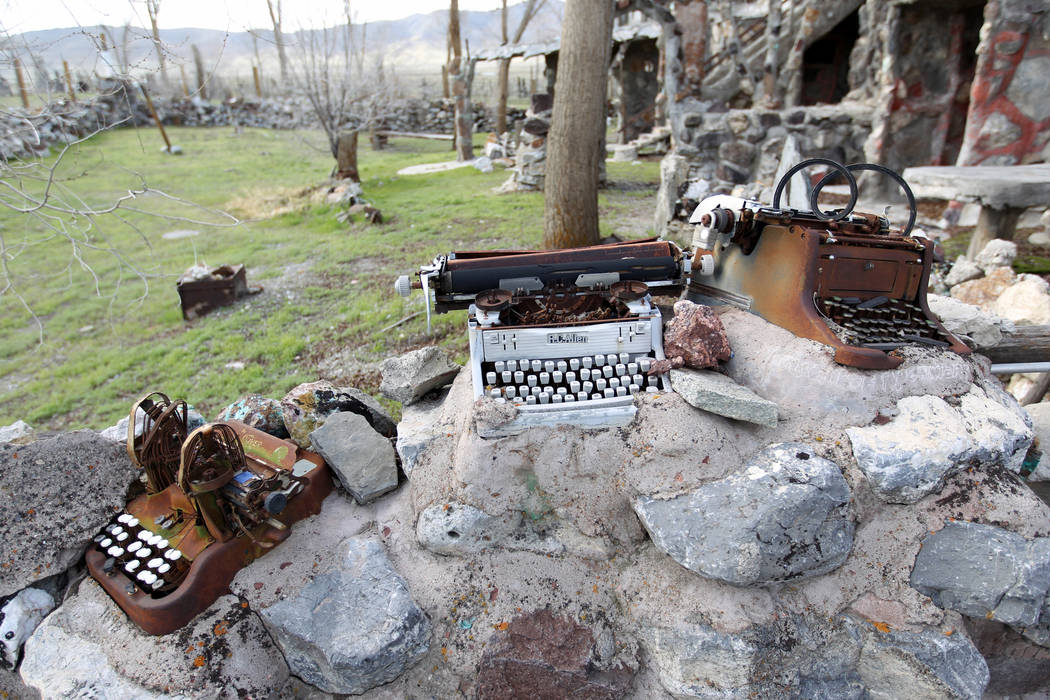 Typewriters and other found items are incorporated into a fence near the main structure and living quarters at Nevada historical site Thunder Mountain Monument near Imlay Tuesday, April 10, 2018. ...