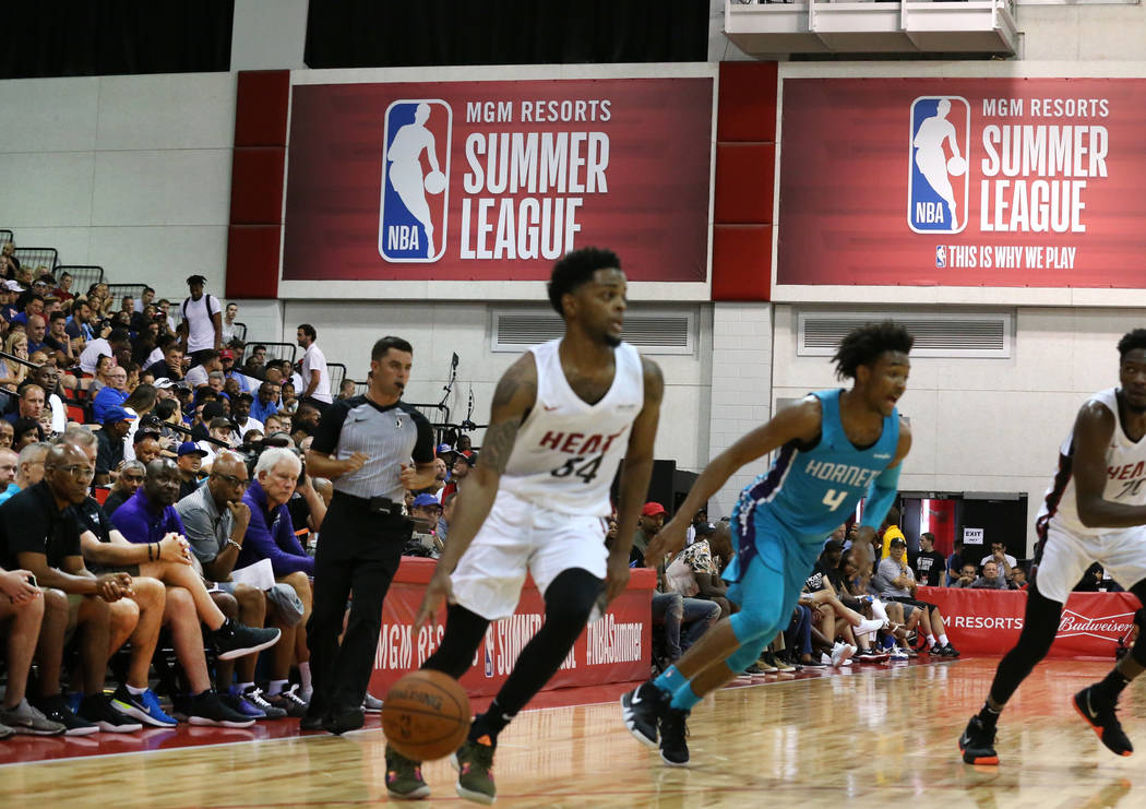 Fans watch an NBA Summer League basketball game between the Miami Heat and the Charlotte Hornets at the Cox Pavilion on Sunday, July 8, 2018, in Las Vegas. Bizuayehu Tesfaye/Las Vegas Review-Journ ...