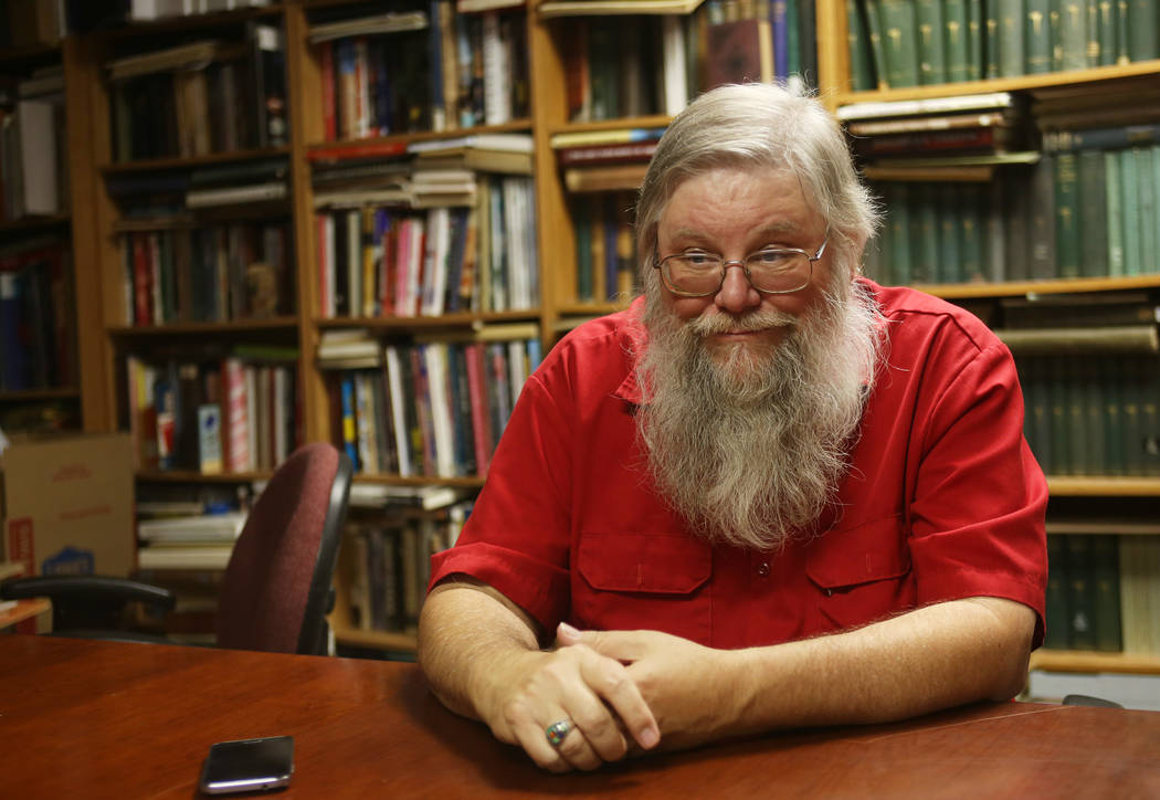 Historian Mark Hall-Patton speaks to the Review-Journal about postcards and maps and how important they are as a record of the past at the Clark County Museum in Henderson on Monday, June 25, 201 ...