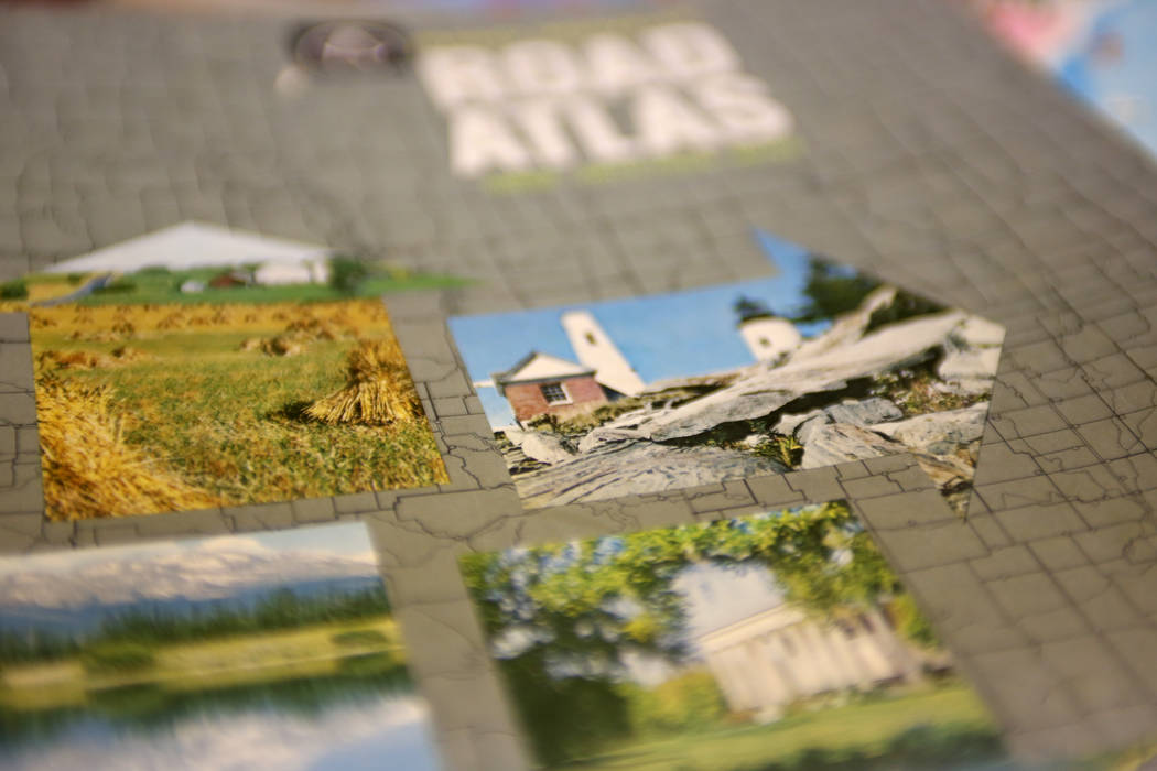 A 1962 Sate Farm Road Atlases at the Clark County Museum in Henderson on Monday, June 25, 2018. Hall-Patton is the Museum Administrator for the Clark County Museum system. He says the lack of prin ...