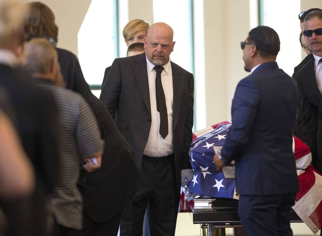 Reality television personality Rick Harrison, left, serves as a pallbearer the funeral service of his father, "Pawn Stars" patriarch, Richard Benjamin Harrison, known as "The Old Ma ...