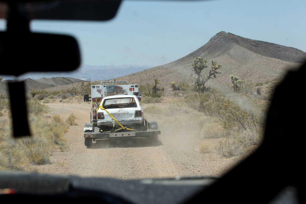 David Nehrbass, owner of Motor Sports Safety Solutions, recovers a car that belonged to the lat ...