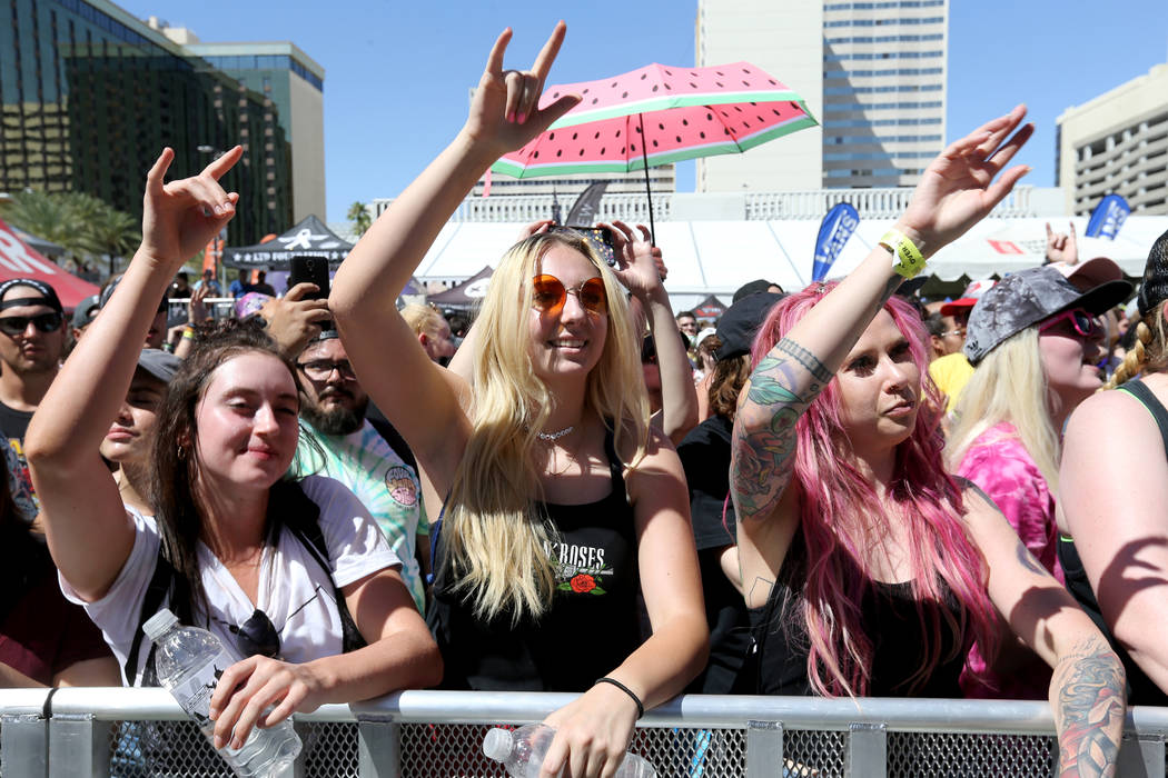 Nicole Fiala, Leah Purvis and Lisa Forrest of Las Vegas listen to Four Year Strong during Warped Tour at Downtown Las Vegas Events Center on Friday, June 29, 2018. K.M. Cannon Las Vegas Review-Jou ...