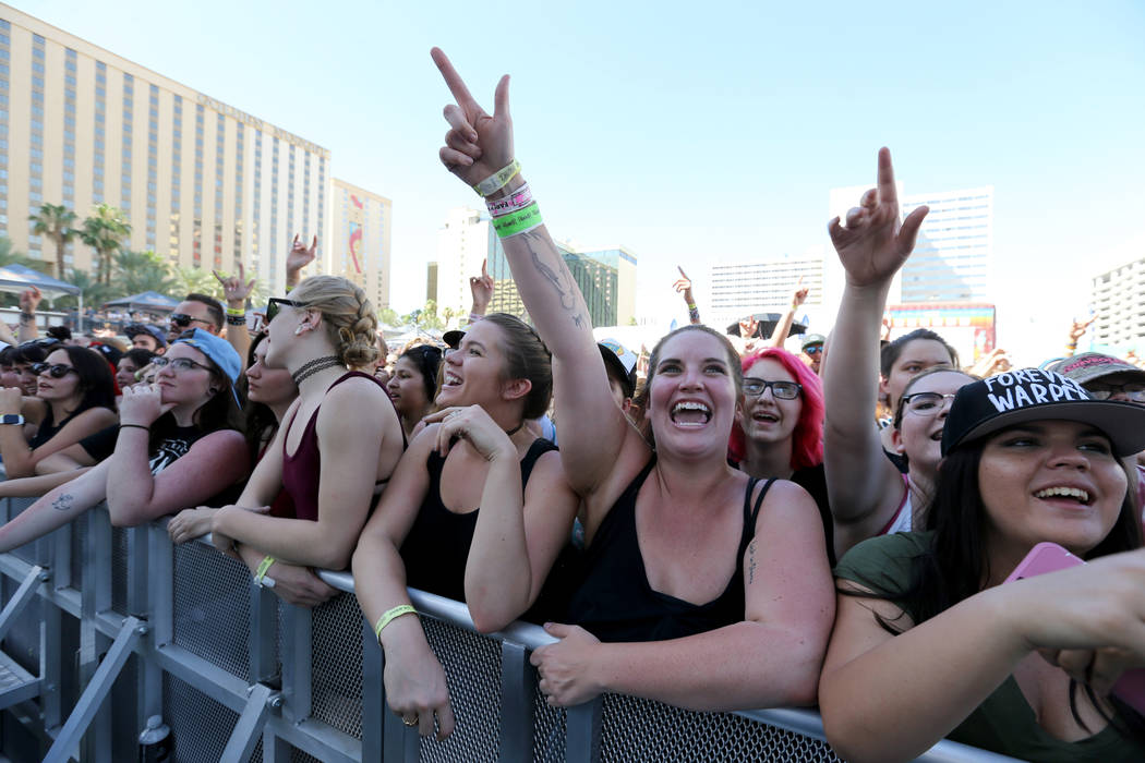 Fans, including Jess Roberts, of Boulder, Colo., second from right, watch Mayday Parade during Warped Tour at Downtown Las Vegas Events Center on Friday, June 29, 2018. K.M. Cannon Las Vegas Revie ...