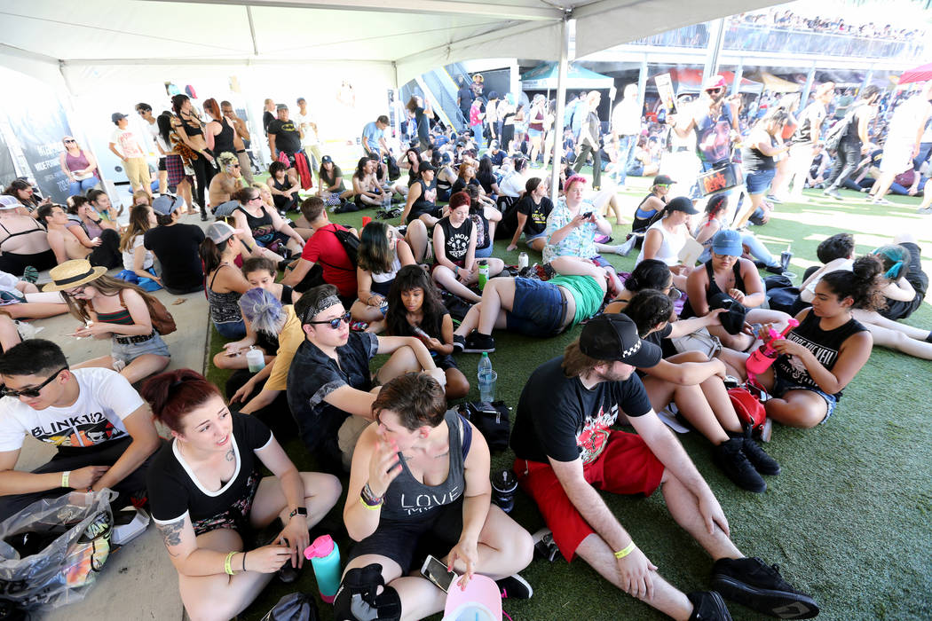 Fans stay cool during Warped Tour at Downtown Las Vegas Events Center on Friday, June 29, 2018. K.M. Cannon Las Vegas Review-Journal @KMCannonPhoto
