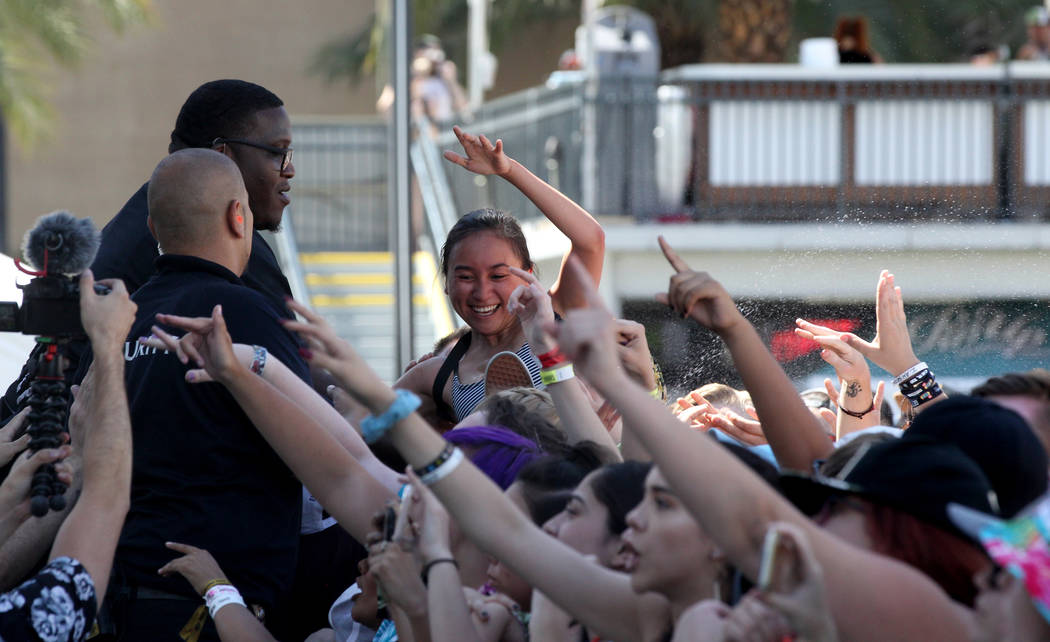 A fan crowd surfs during Warped Tour at Downtown Las Vegas Events Center on Friday, June 29, 2018. K.M. Cannon Las Vegas Review-Journal @KMCannonPhoto