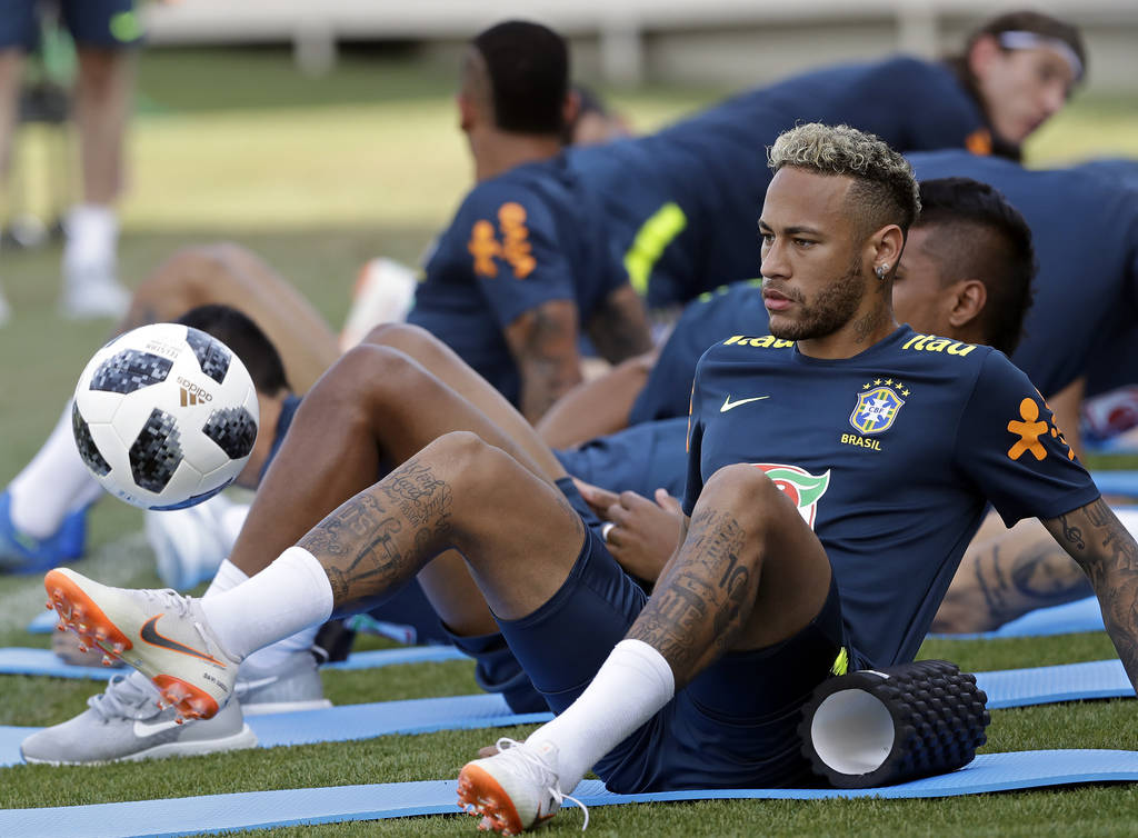 Brazil's Neymar and teammates attend a training session, in Sochi