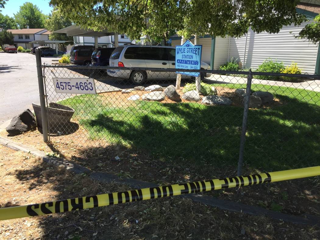 Police tape blocks off an area at a Boise, Idaho, apartment complex, Sunday, July 1, 2018, where nine people were stabbed during an attack that targeted a child's birthday party the night before. ...