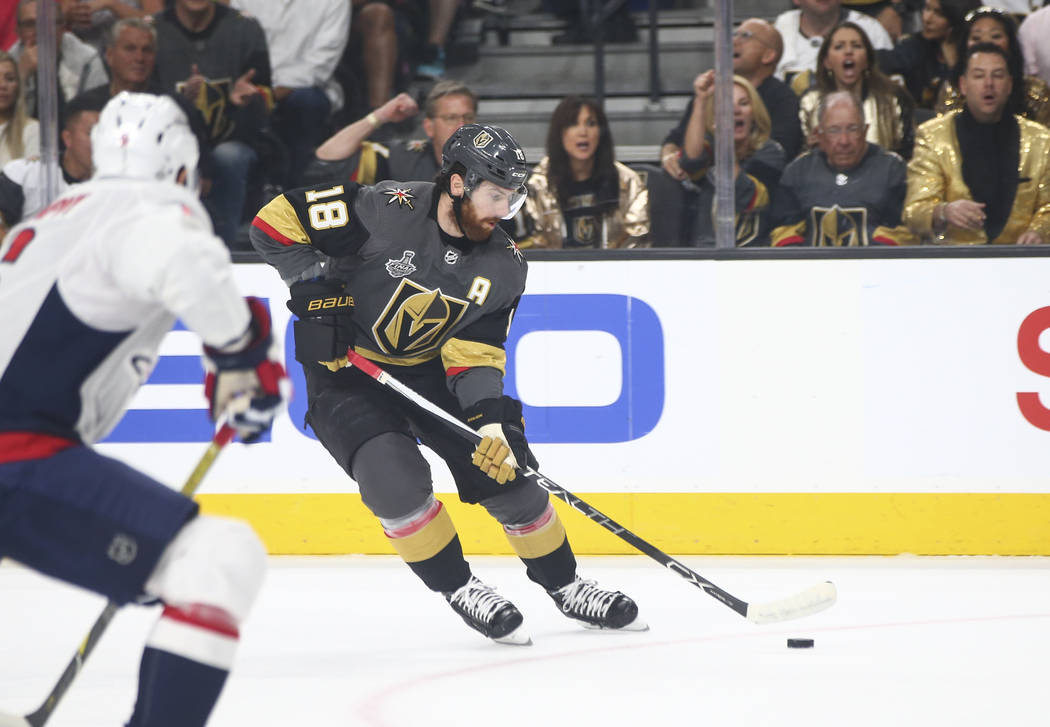 Golden Knights left wing James Neal (18) lines up his shot before scoring against the Washington Capitals during the first period of Game 2 of the NHL hockey Stanley Cup Final at the T-Mobile Aren ...