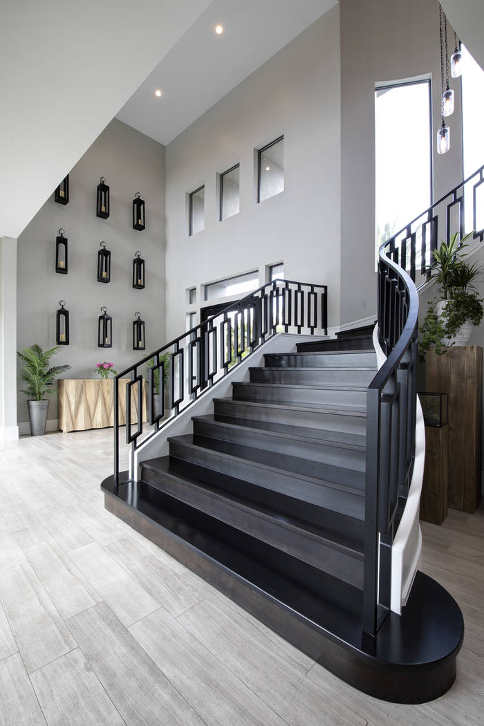 The staircase leads to the bedrooms upstairs. (Sotheby’s International Realty)