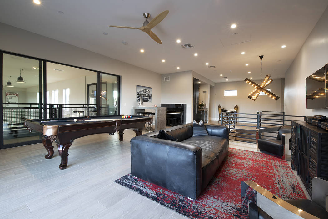 The game room overlooks the basketball court. (Sotheby’s International Realty)