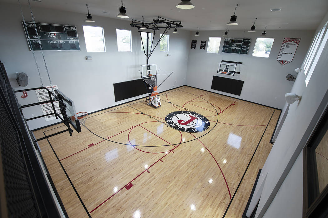 The basketball court is one of the wow features of the home. (Sotheby’s International Realty)