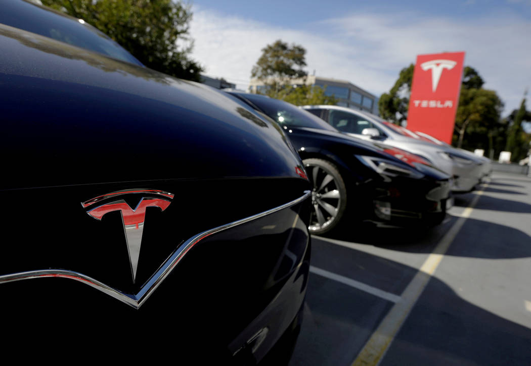 FILE PHOTO: A Tesla Model X is seen alongside a Model S at a Tesla electric car dealership in Sydney, Australia May 31, 2017. REUTERS/Jason Reed/File Photo