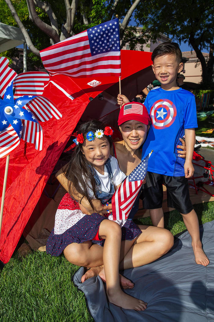 From left, Tenley, 5; Connie Chow; and Jace Chow, 7, attend the annual Summerlin Council Patriotic Parade. (Summerlin Council – Studio J, Eric Jamison)